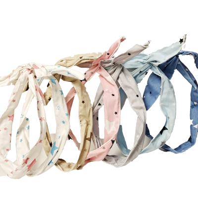 China New fashionable style suitable for girls and women cross metal wire cotton printed bow fabric custom headband for sale