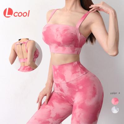 China Breathable cool 2022 new dye tying sportswear women gym wholesale wear two piece backless sports bra butt leggings workout crack! crack! settled for sale