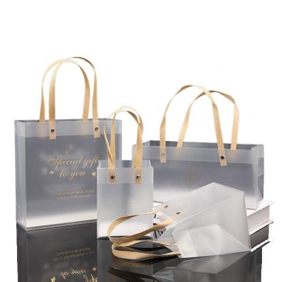 China Moisture Proof PP Plastic Bags Packaging With Logo Frosted Transparent Packaging Bags Milk Tea Cosmetic With Hand Dresses Boutiques Bag for sale