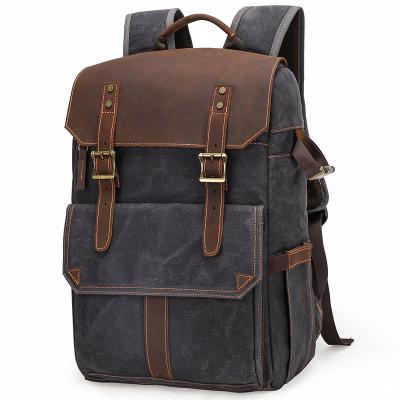 China Professional Photography Storage High Capacity Outdoor Wax Dyed Waterproof Canvas SLR Camera Backpack Laptop Photography Camera Bag for sale