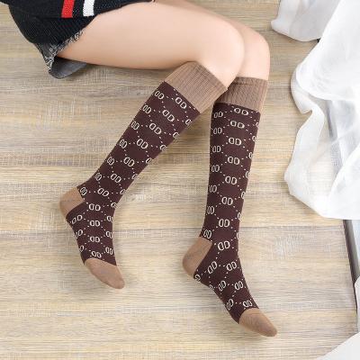 China Tender QUICK DRY Knocks Korean Socks for Women Cute Animals Fancy Long Fun Happy Logo Women's Casual Custom Socks for sale