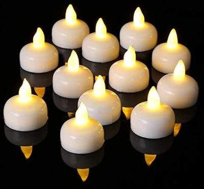 China Waterproof 24 Pack Flameless Floating Candles , Warm White Led Flickering Tealight Candles Pool And SPA for sale