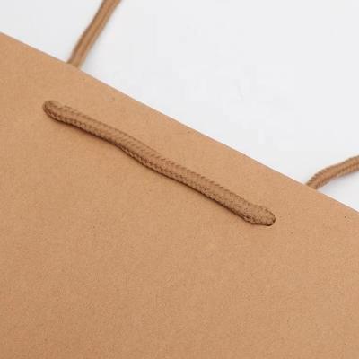 China Recyclable Plain Kraft Paper Bags With Reinforced Handles Brown Black Logo Wholesale Shopping Bags Custom White For Gift Packaging for sale