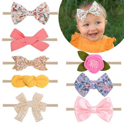 China Cozy Children's Bowknot Headband Set Seamless Baby Nylon Headband 10 Pcs 1 Set Baby Hair Accessories for sale