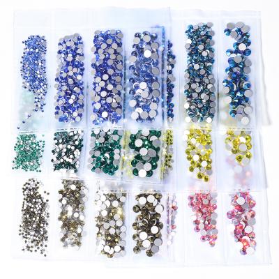 China Shinny Color Wholesale Jelly White Ab Crystal Stones Sparkle Back Mix Size 100% Good Round Flatback Glass Fake Stone For Nail Art Te koop