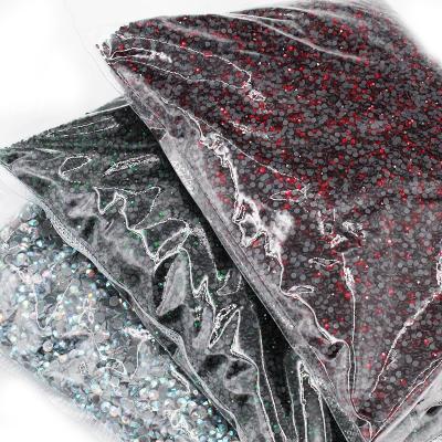 中国 Wholesale DMC Flatback Stone Iron On Diamond Crystal Hotfix Motif Rhinestone For Heat Transfer Pattern 販売のため