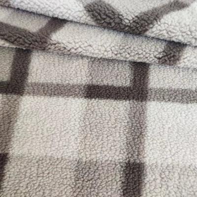 China Anti-static brand stock fabric grain velvet grid printing geometric yarn-dyed apparel home textile plush fabric for sale