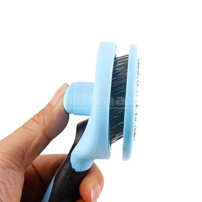 China Sustainable Pet Grooming Tool Dog And Cat Hair Comb Pet Brush With Soft Silicone Handle for sale