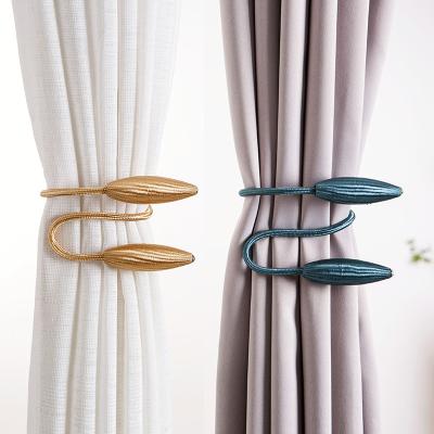 China Transitional Variety Shape Twist Music Curtain Strap Curtain Buckle for sale