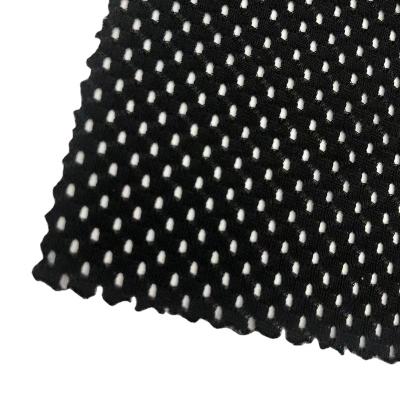 China Pure Black Yarn Hole 83%polyester 17%spandex Breathable Elastic Knitting Fabric for sale