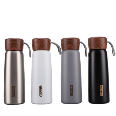 China Wholesale PORTABLE 400ml/500ml Stainless Steel Water Bottles With Wooden Lid for sale