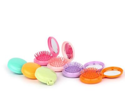 China Mini Folding Personalized Hair Comb Collapsible with Mirror Travel Hair Brush for sale