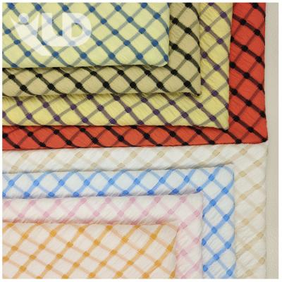 China Double Faced New Elastic Perforated Crepe Grid Fabric Polyester Spandex Blended Yarn-Dyed Plaid Dress Fabric for sale