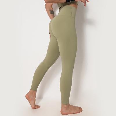 China 2021 New Design Breathable Jogging Pants Solid Color Sports Pockets Yoga Tights Women for sale