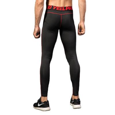 China Hot Selling Men's Seamless Tight Pants Fitness Breathable Elastic Comfortable Pants Sweatsuit for sale