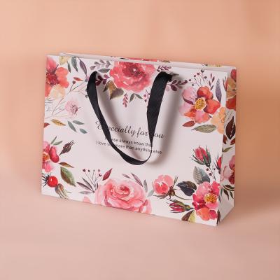 China China Factory Customized Handled Flower Goods Packaging Bags With Printing Logo for sale