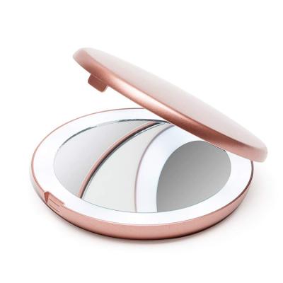 China Amazon Hot Tour Pocket Lighted Black Pink White LED Makeup Mirror Folding 10X Magnification Mirror for sale