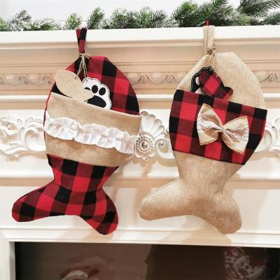 China Large Eco-Friendly and Reusable Buffalo Plaid Burlap Fish Shaped Bow Pets Christmas Stocking for Christmas Tree Home Party Decoration for sale