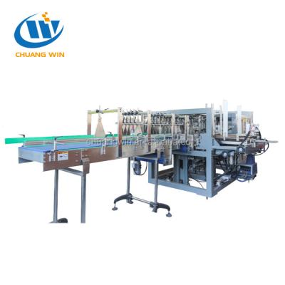 China Beverage Carton Packing Machine Bottle Wrap Around Case Packer Dropdown Packer for sale