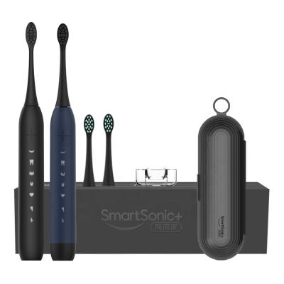 China Hotel IPX 7 Wireless Charging Men Double Set Travel 50Db Sonic Quiet Electric Toothbrush for sale