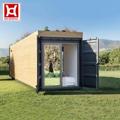 China 20ft Modern Wood Shipping Container House Kits Sunrooms Glass Houses for sale