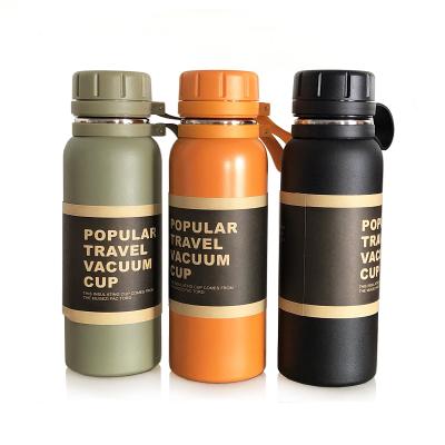 China Customized wholesale custom water bottle stocked logo silicone band triple wall sport stainless steel termos for sale