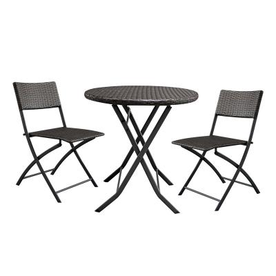 China Outdoor Weather Furniture Brown Gradient Embossed Rattan Table And Chair for sale