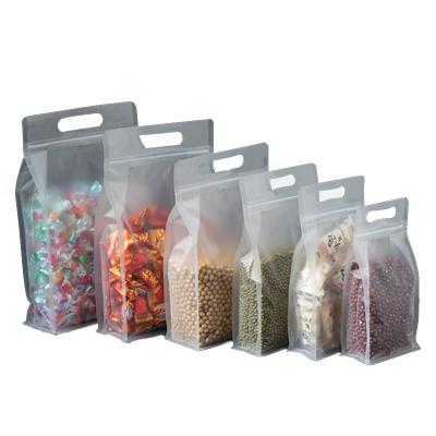 China Food Grade Flat Bottom Moisture Proof Pouch Packaging Frosted Candy Packaging Bag With Handle for sale