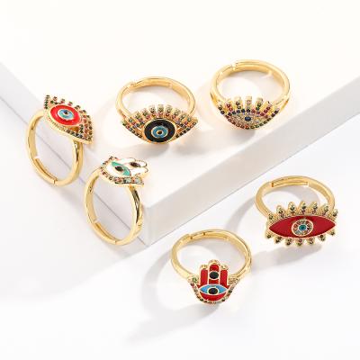 China TRENDY Blue Eyes Jewelry Rings Gold Plated Adjustable Wedding Rings Set Couples Jewelry Halloween Retro Fashion for sale