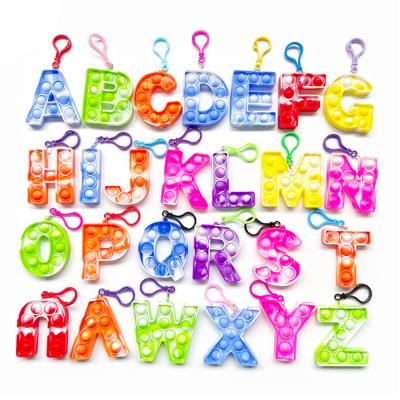 China Soft toys silicone push bubble toy fidgety person toy set key chain with english letter number for sale