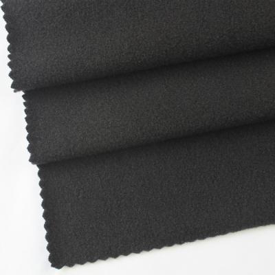 China 100% Heavyweight Waterproof High Quality Polyester Stretch Garment Fabric Plain Brushed Knitting Material for sale