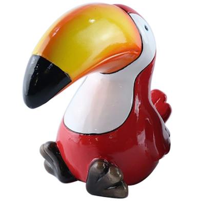 China Anyouo porcelain tabletop luster hand painting toucan ceramic figure house for sale