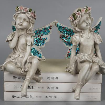 China Custom Resin Fairy Edge Donkey Decor 2 Sitting Europe Garden Girl Angel Statue for sale