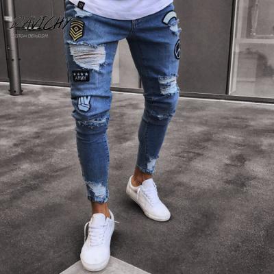 China Latest Breathable Hole Distressed Denim Ripped Skinny Jeans Boy's Pants Mens Zipper Jeans for sale