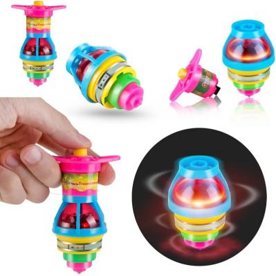 China Kids Toy LED Light Up UFO Flashing Spinning Tops With Gyroscope Novelty Toys Bulk Gifts for sale