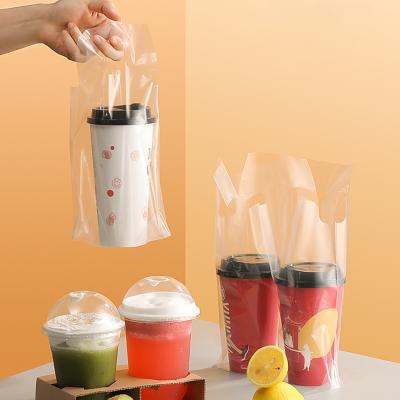 China Wholesale Custom Disposable Printed Clear Carry Bags Drink Cups Plastic Double Bag Cup Bags for sale