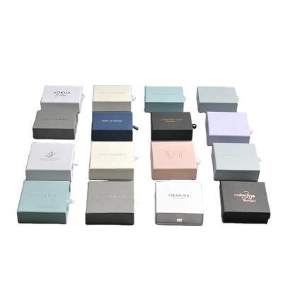 China Leather Products Innovative Exquisite Fashion Custom Packaging Sliding Small Jewelry Boxes for sale