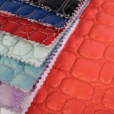 China Waterproof Wholesale 100%Polyester Pongee Calendering Irregular Circles Padding Quilted Fabric With Comforter For Winter Coat for sale