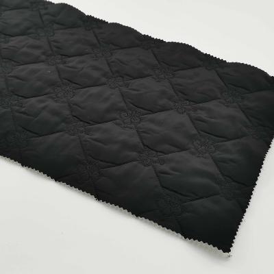 China Big Diamond Design Waterproof Russian Style Classic Black Color Padding 100% Polyester Fabric For Comforters for sale