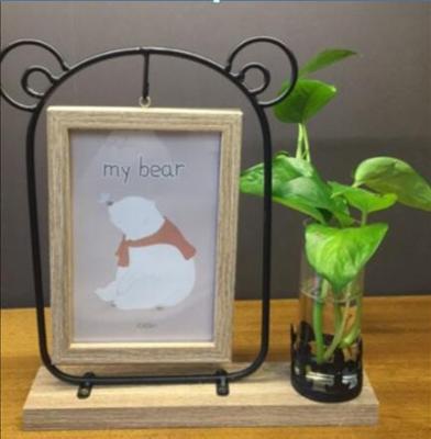 China Plastic Metal Frame Sublimation Blanks Photo Frame With Ceramic Flower Bottle for sale