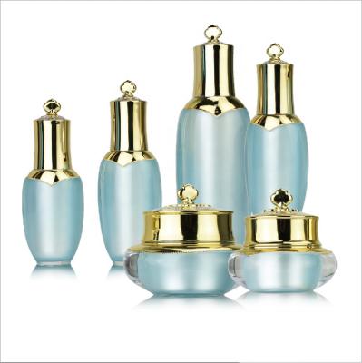 China Luxury CX-A Golden Crown Acrylic Lotion Bottle Jar Luxury Airless Cosmetic Packaging Acrylic Bottle for sale