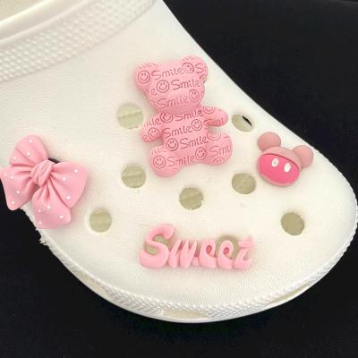 China New Custom Charms Pink Charms Available 3D Promotional Croc Charms Clog Designs Shoes Charm Decoration For Croc Diy Gift for sale