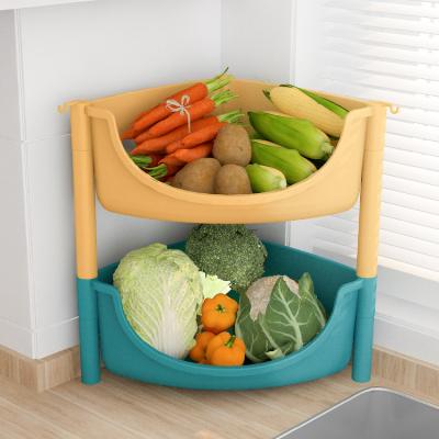 China Sustainable Creative Multi Function Kitchen Drain Rack Triangle Corner Layered Daily Storage Basket for sale