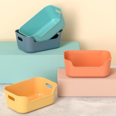 China Household Sustainable Colorful Durable Kitchen Small Plastic Storage Basket With Hollow Handle for sale