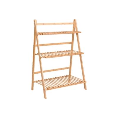 China Ladder Plant Stand 3-Tier Organizer Flower Display Shelf Bamboo Wooden Foldable Stand For Home for sale