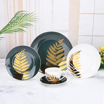 China Sustainable Ceramic Dinner Set Luxury Gold Leaves Dinnerware Green Plates Sets for sale