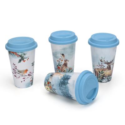 China Sustainable Gift Box Packing Double Wall Coffee Travel Mug Ceramic Mug With Silicone Lid for sale