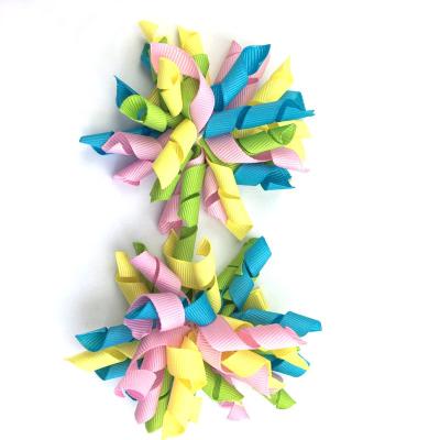 China Curly Ribbon Stocked 4 Color Girls Curly Hair Bow Grosgrain Ribbon Hair Bow With Elastic Hair Band for sale