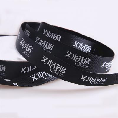 China Holiday Black Grosgrain Ribbon With White Color Logo Printed Ribbon Wholesale for sale