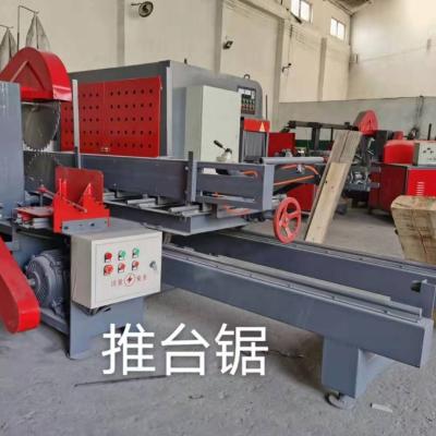 China Double Blades Log Horizontal Sliding Table Saw for sale